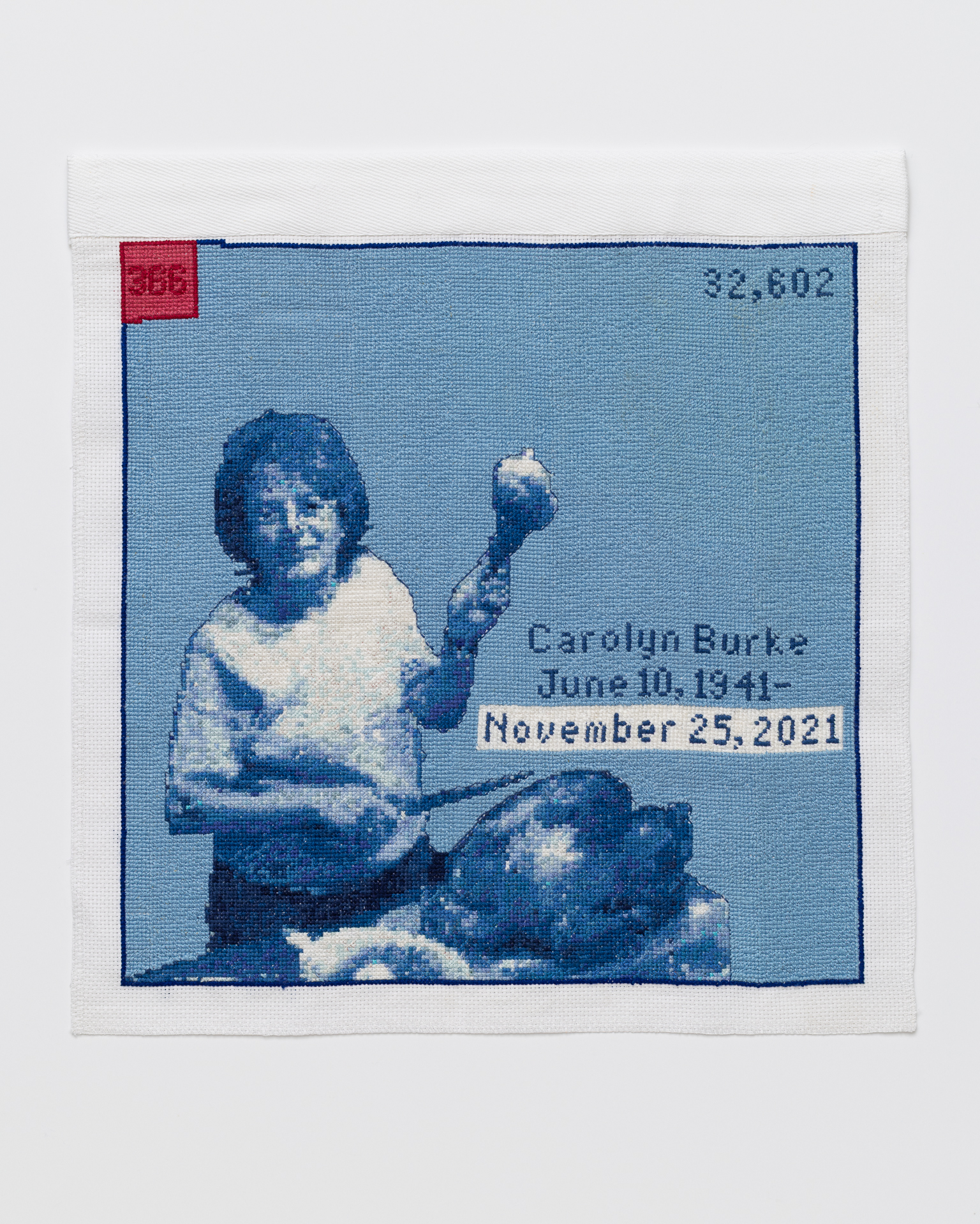 Nov 25, 2021 Cross stitch embroidery of a woman with short hair in a plain t-shirt holding up a turkey leg in her left hand, with a knife in her right hand. A cooked turkey sits on a table in front of her. Stitched in blue threads, with a red square in the top left corner. Across the middle right of the image is written "Carol Burke June 10, 1941 - November 25, 2021"