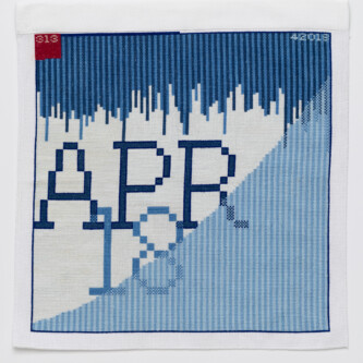 Cross stitch embroidery of "APR 18" in large letters on dark, light, and very light blue striped abstract background. a red square is in the top left corner with "313" in pink. "42018" is in the top right.