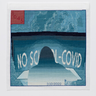 Photo by Wes Magyar (es translation) Cross stitch embroidery of back of person with long hair sitting at a desk, in front of a screen. On the screen is written "NO SCHOOL-COVID" The embroidery is varying colors of blue/teal, with a red square in the upper left corner. "3/10/2022" is written across the bottom middle of the image.